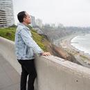 Photo of Alonso Llerena looking out at the water