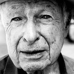 This is a black and white headshot of Playwright, Peter Brook.