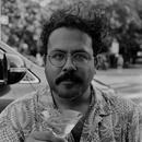 A black and white photo of Terrence Arjoon A black and white photo of Terrence Arjoon