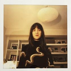 A polaroid photo of Chloe Stagaman