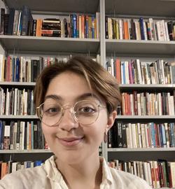 Photo of Marian Chudnovsky in front of a bookcase 