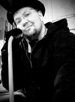 A black and white photo of Jay Besemer A black and white photo of Jay Besemer