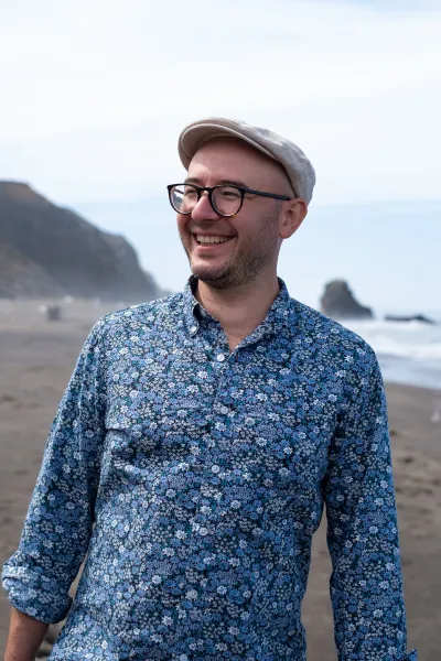 A photo of Jake Marmer on a beach 