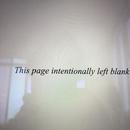 An image of a screen displaying a page in a book, black text on a white background says “this page intentionally left blank.” A silhouette of a figure is reflected in the screen. 