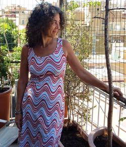 Photo of Maria Grazia Calandrone on a balcony.