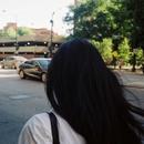 The back of Megan Sungyoon's head on a street