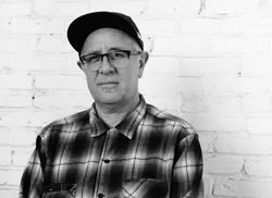 Black and white photo of Rubén Ortiz-Torres Black and white photo of Rubén Ortiz-Torres