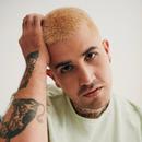 A photo of Christopher Soto in a pale green T shirt A photo of Christopher Soto in a pale green T shirt